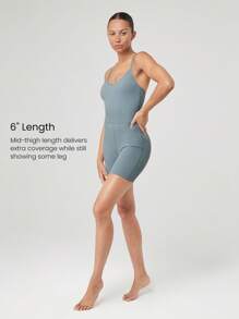 GLOWMODE 6" FeatherFit™-Air Studio To Sunset Plunge Crossover Back Deep V-Neck Active Jumpsuit Romper Yoga Pilates Removable Cups - Grey - View 4