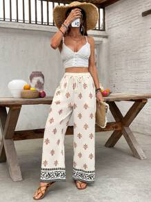 SHEIN Frenchy بنطلون نسائي كاجوال مستقيم فضفاض بخصر رباط مطبوع بطبعات زهرية متناقضة، مناسب للاستخدام اليومي والعطلات الصيفية والشاطئ والحفلات والرحلات الأوروبية الصيفية