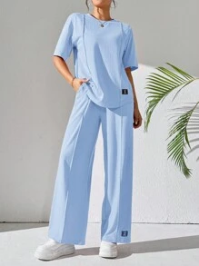 Mulvari Women's Casual Two-Piece Outfit: Knitted Fabric, Short Sleeve Round Neck Top And Long Patched Pants In Sky Blue - Blue - View 3