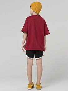 SHEIN Explorewe 1 pieza Camiseta de manga corta holgada con gráfico de letras y números para niñas, versátil para viajes, juegos al aire libre y uso escolar