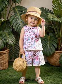 Tenue pour bébé fille, Top à col rond avec imprimé fleuri et franges, assorti à un short. Tenue polyvalente et décontractée, adaptée pour le port quotidien.