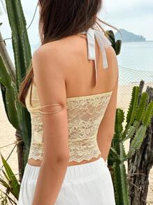 Jouncy Top transparente sin mangas con aplicación de encaje de estilo minimalista y moderno para mujeres