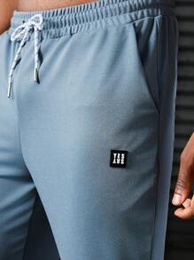 Manfinity Sport Corelite Men's Letter Printed Drawstring Waist Pocket Sports Pants Workout Clothes Running Pants