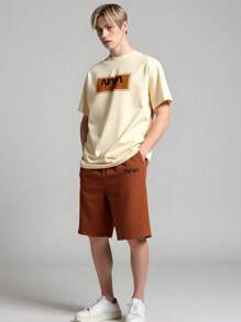 Wildeya Conjunto de 2 piezas para niños adolescentes de moda casual: Camiseta de manga corta de cuello redondo negra con estampado de letras y shorts de tejido caqui, nuevo conjunto clásico de verano