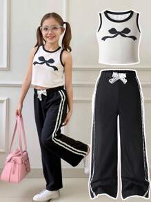 Unlock A Sweet New Style! Spring/Summer Young Girl Printed Vest With Black Trim Paired With Black Lace Trim Pants, Featuring Cute Bow Print And Elegant Lace Trim Details For A Graceful Princess Look, Comfortable And Fashionable 2 Pieces Set,Holiday,Summer,Travel