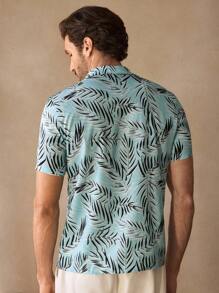 Manfinity ModaGents Camisa casual tejida de manga corta y corte slim con estampado de plantas tropicales para hombre