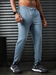 Manfinity Sport Corelite Men's Letter Printed Drawstring Waist Pocket Sports Pants Workout Clothes Running Pants