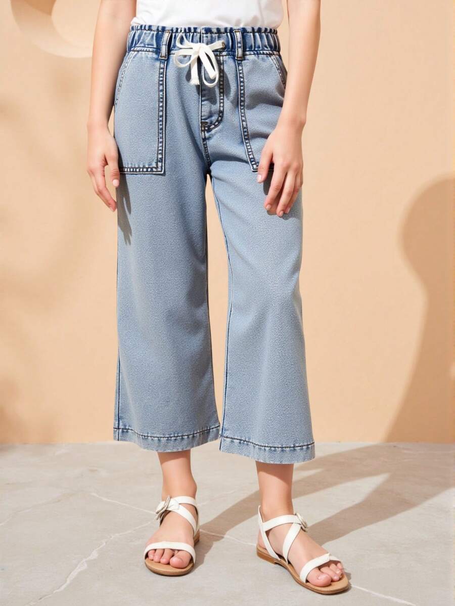 DENIMLY 女童春夏复活节假期轻度洗涤,配有抽绳平装腰带和平口袋,莱赛尔面料让您的少女肌肤在夏日酷爽。宽松阔腿版型。 - 淺色水洗藍 - 查看 1