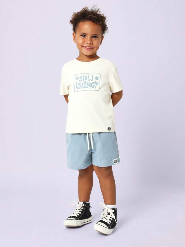 SUMWON Conjunto de verano para niños de short y camiseta con estampado gráfico - conjunto playero casual, ropa de ocio para las vacaciones y uso diario, un básico en el armario de los niños
