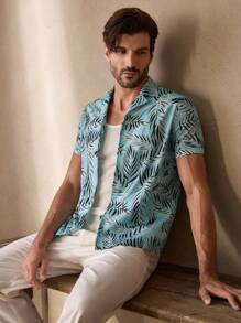 Manfinity ModaGents Camisa casual tejida de manga corta y corte slim con estampado de plantas tropicales para hombre