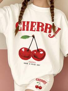 SHEIN Conjunto informal de 2 piezas de niña preadolescente, conformado por una camiseta de manga corta y pantalones cortos, con un patrón de cereza vintage, apropiado para el verano
