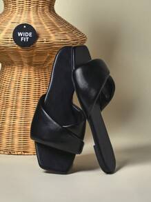 SHUZIA Sandalias planas minimalistas de mujer con cierre cruzado y ajuste ancho