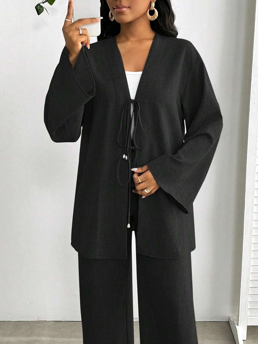 SHEIN Lady Bộ đồ 2 mảnh cỡ lớn năm 2025 dành cho nữ, áo dài tay buộc nơ phía trước và quần dài, bộ đồ hai mảnh cỡ lớn dành cho nữ, trang phục đi biển cho nữ, trang phục công sở thường ngày cho nữ, váy dự tiệc cưới cho nữ, trang phục mùa thu cho nữ, trang phục giáo viên cho nữ, trang phục công sở thường ngày cho nữ, váy thanh lịch cho nữ, quần áo đi làm cho giáo viên nữ, trang phục kỳ nghỉ cổ điển cho nữ, bộ đồ ngủ hai mảnh phong cách Boho cho nữ, bộ đồ ngủ 2 mảnh cho nữ, bộ đồ ngủ cỡ lớn cho nữ, bộ đồ ngủ cỡ lớn 2 mảnh cho nữ - màu đen - Xem 1