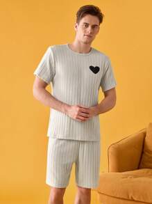 طقم بيجامة تيشيرت أكمام قصيرة ذو رقبة دائرية وشورت لون أحادي للرجال ، موضة صيفية