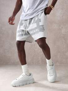 SUMWON Pantalones cortos tipo drop crotch de nailon atlético con estampado gráfico del archivo Sumwon, cintura con cordón cómoda, ajuste relajado, para entrenamiento, correr, baloncesto, ropa deportiva de verano y uso urbano