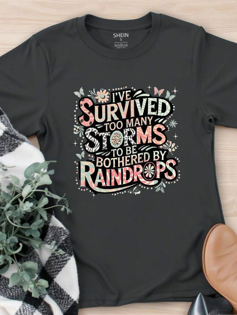 Glissea Blusa de mujer 'He sobrevivido a demasiadas tormentas para ser...' Camiseta gráfica de manga corta