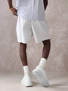 SUMWON Pantalones cortos tipo drop crotch de nailon atlético con estampado gráfico del archivo Sumwon, cintura con cordón cómoda, ajuste relajado, para entrenamiento, correr, baloncesto, ropa deportiva de verano y uso urbano
