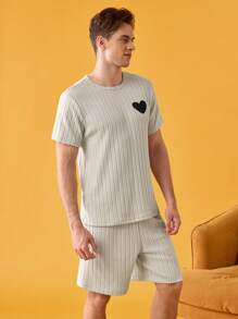 طقم بيجامة تيشيرت أكمام قصيرة ذو رقبة دائرية وشورت لون أحادي للرجال ، موضة صيفية