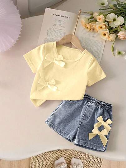 SHEIN Set de 2 piezas de ropa de verano para niñas - Pantalones vaqueros casuales de moda y camiseta de lazo unicolor, ligera y cómoda