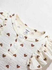 Bộ đồ liền thân màu mơ cho bé gái có họa tiết trái tim, vải dệt có mũ hoa dễ thương, thiết kế đa năng và thanh lịch - Màu be - Xem 5