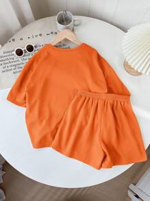 SHEIN LMoss Kids طقم تي شيرت وشورت ذو ياقة دائرية بأكمام قصيرة ولون كتان مصنوع من نسيج مطرز لفتيات ما بين الطفولة والمراهقة، مناسب لمهرجان الموسيقى - لون برتقالي - مشاهدة 2