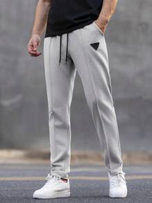 Manfinity Homme Pantalones de chándal casuales para hombre con cintura con cordón y bolsillos, estampado geométrico