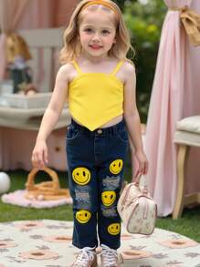 SHEIN طقم قميص كامي بتصميم غير متماثل والبنطال المطبوع بوجه الضحك للفتاة الصغيرة، 2 قطعة