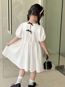 SHEIN Vestido de manga abultada con estampado floral jacquard en estilo princesa para niñas jóvenes, color beige