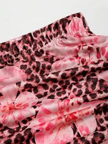 EgrlEra 2 件豹纹花卉印花 V 领露背吊带短款上衣和荷叶边不对称下摆迷你裙套装，性感时尚的设计，适合春夏季休闲、度假和派对场合