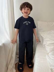 DAZY 2 piezas Conjunto de ropa para niño pequeño con top de punto de manga corta con estampado de letras y pantalón tejido a cuadros para usar en casa, primavera/verano