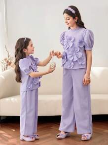 SHEIN Completo da ragazza tween in 2 pezzi: blusa con collo alto, maniche a palloncino e decorazione floreale 3D, pantaloni a vita alta e gamba ampia - Viola - Visualizzare 5