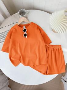 SHEIN LMoss Kids طقم تي شيرت وشورت ذو ياقة دائرية بأكمام قصيرة ولون كتان مصنوع من نسيج مطرز لفتيات ما بين الطفولة والمراهقة، مناسب لمهرجان الموسيقى - لون برتقالي - مشاهدة 7