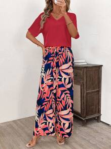 SHEIN Clasi Conjunto de 2 piezas con estampado amarillo: Camiseta de manga corta de cuello en V de unicolor y pantalones largos, de moda para el verano