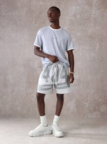 SUMWON Pantalones cortos tipo drop crotch de nailon atlético con estampado gráfico del archivo Sumwon, cintura con cordón cómoda, ajuste relajado, para entrenamiento, correr, baloncesto, ropa deportiva de verano y uso urbano