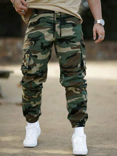 Manfinity Homme Pantalones cargo con estampado de camuflaje, bolsillo con solapa y cintura con cordón, pantalones largos de uso diario, para regalos a esposo o novio, para otoño