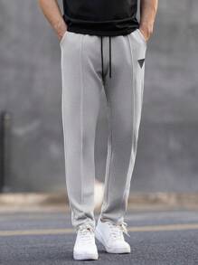 Manfinity Homme Pantalones de chándal casuales para hombre con cintura con cordón y bolsillos, estampado geométrico