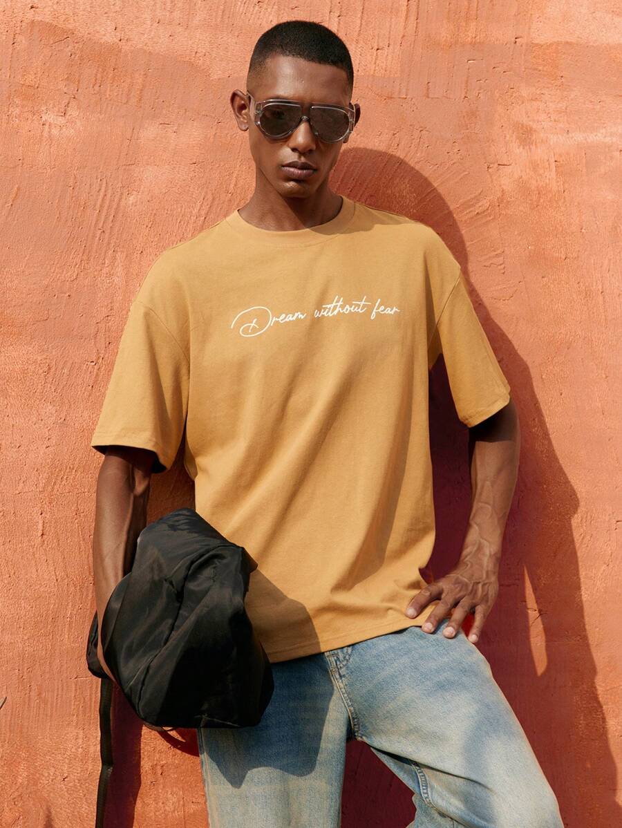 Maija 2025夏季新款音乐节派对毕业典礼海滩度假早午餐邮轮穿搭波西米亚复古街头风宽松简约休闲印花T恤，芥末黄男士款 - 棕色 - 查看 1