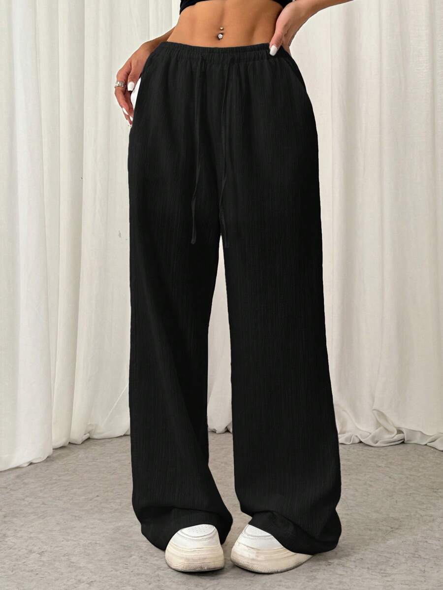 SHEIN EZwear Pantalones casuales de pierna recta con cordón, de textura arrugada y corte holgado para mujer