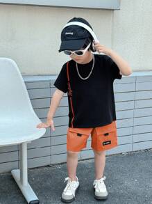 SHEIN 2 件套年轻男孩休闲百搭圆领 T 恤和霓虹绿色实用短裤套装，适合春夏季、日常穿着、运动、郊游、学校、聚会、节日、表演和拍照 - 橘色 - 查看 5
