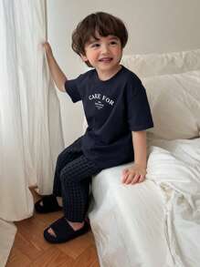 DAZY 2 piezas Conjunto de ropa para niño pequeño con top de punto de manga corta con estampado de letras y pantalón tejido a cuadros para usar en casa, primavera/verano