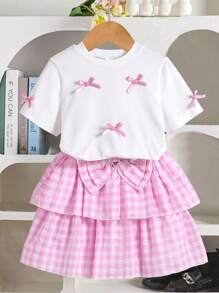 Elladie kids 青春期前女孩的白色衬衫，带有蝴蝶结装饰，搭配双层裙子，适合日常穿着或度假