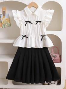 SHEIN Tween Girls' Cute Summer School Back-To-School Black And White 2 Pieces Set,Woven Cap Sleeve Bow Ruffle Trim White Blouse And Black Pleated Skirt - Black and White - View 1