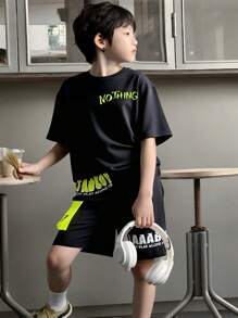 SHEIN 2pcs Set: Boys Casual Sports Round Neck Drop Shoulder Short Sleeve Letter Print T-Shirt & Elastic Waist Shorts, Summer - Black - View 1