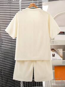 Conjunto informal de 2 piezas con camiseta holgada de tela de textura de gofre con rayas de color contrastante para adolescentes