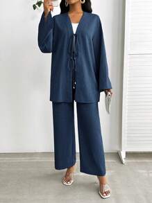 SHEIN Lady Conjunto de 2 piezas de talla grande para mujer, top de manga larga con nudo delantero y pantalones, de color azul denim sólido. Conjunto de 2 piezas de talla grande para mujer, conjunto de playa casual para mujer de negocios