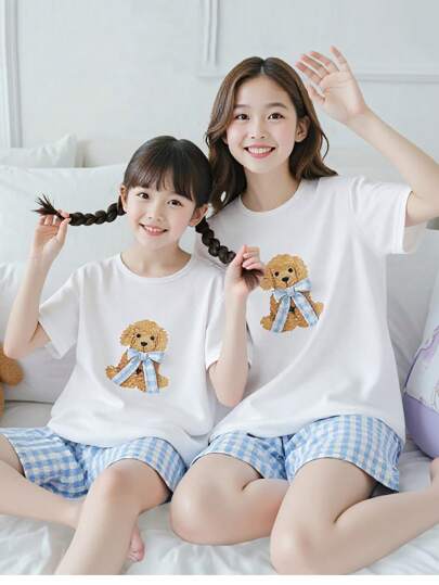 Bộ đồ ngủ 2 món cho bé gái tuổi teen, áo thun tay ngắn in hình chú chó hoạt hình & nơ + quần short kẻ caro, đồ mặc ở nhà