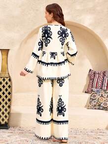 SHEIN Nastolatki Eid Al Adha, Ramadan, Święto Narodowe, Walentynki, Chinoiserie, Narodowe, Luźna koszula z nadrukiem kwiatowym i szerokie spodnie 2 sztuki - Morela - Zobacz 2