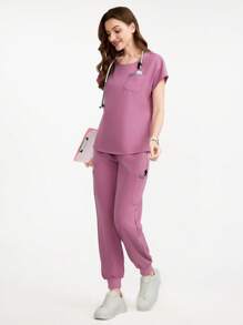 Scrubzie Conjunto de uniforme de ropa médica con top de cuello redondo de color liso con bolsillo y pantalones