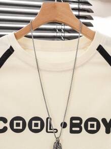 Conjunto informal de 2 piezas con camiseta holgada de tela de textura de gofre con rayas de color contrastante para adolescentes