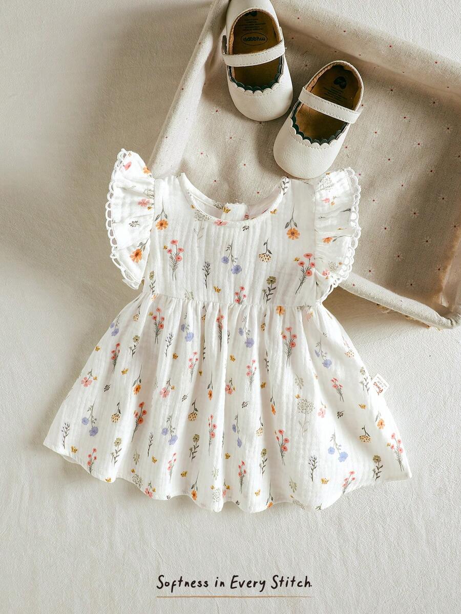 Cozy Pixies Đầm sơ sinh cho bé gái cổ tròn tay lửng họa tiết hoa nhỏ nhắn - Nhiều màu - Xem 1